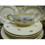 A small quantity of Clarice Cliff tableware decorated flowers