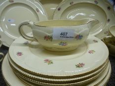 A small quantity of Clarice Cliff tableware decorated flowers