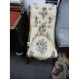 A Victorian Rosewood slipper chair, having button back, on cabriole legs