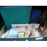 A small carton of used stamps, some in albums and sundry