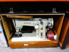 A vintage singer sewing machine, a set of A1 mark bowls, a briefcase and a slide projector