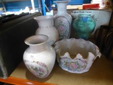 Four vases and an oval bowl