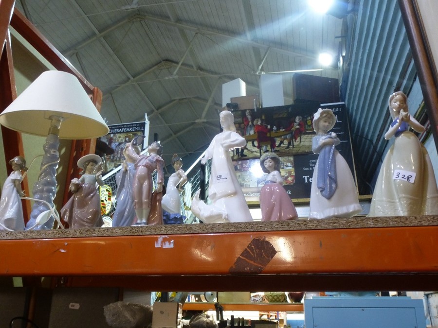 A quantity of Nao figures including a lamp, a Lladro Matador and Doulton lady with chickens