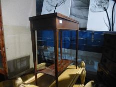 A miniature Edwardian mahogany foldover tea table having chequer inlay and undertier, 55.5 cms