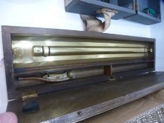 A brass panelled rolling rule, patt 160100 and a Bosun's whistle