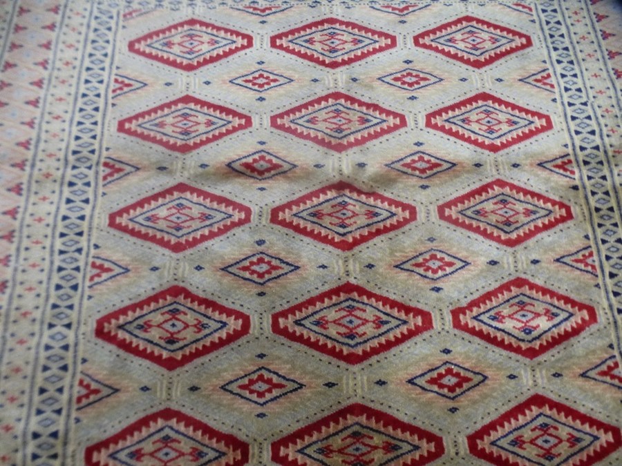 A modern square Bokhara rug having fifteen central diamond pods 115cm x 128cm - Image 2 of 2