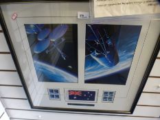 A framed display relating to the space shuttle discovery and an official Aussat flag which was aboar