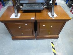 A pair of modern two drawer bedside chests