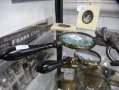 Two inch and four inch plated magnifying glasses