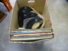 A carton of old Lp's and singles mainly 1970's