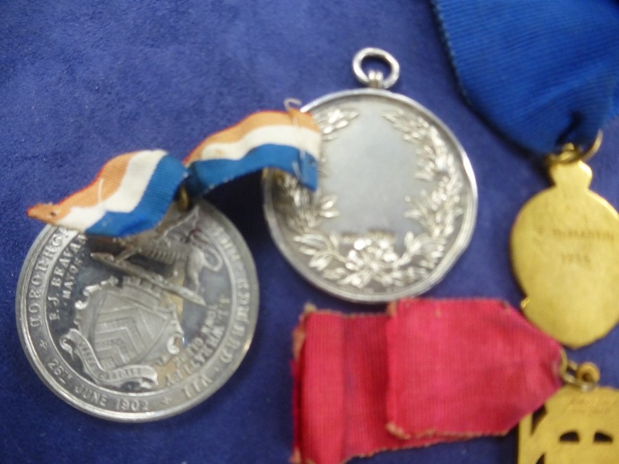 A silver medal of firefighter rescuing a child and other presentation medals - Image 3 of 3