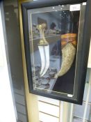 A Far Eastern style dagger and sheath, in glazed display case