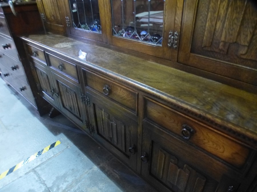 A reproduction oak sideboard having two central gl - Image 2 of 3
