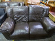 A pair of brown leather reclining two seat sofa's