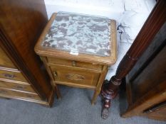 An antique mahogany torchere and a French marble top bedside cupboard