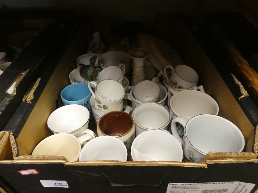 Two cartons of mugs and similar, and a wicker basket with contents