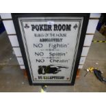 A framed poster for rules of the poker room