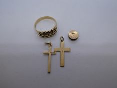 Two 9ct yellow gold cross pendants unmarked yellow metal knot ring gold stud, etc, weight approx 6.1