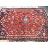 A Hamadan style rug having central motif, 305x205cms