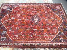 A Hamadan style rug having central motif, 305x205cms