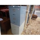 Two small fishing cabinets and a formica table