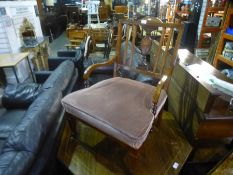 An Edwardian rosewood octagonal occasional table having inlaid decoration and an Edwardian armchair