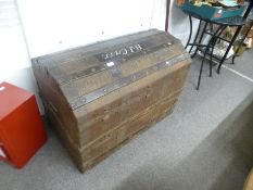 An antique dome topped trunk, wooden bound with leather effect covering, 91cms