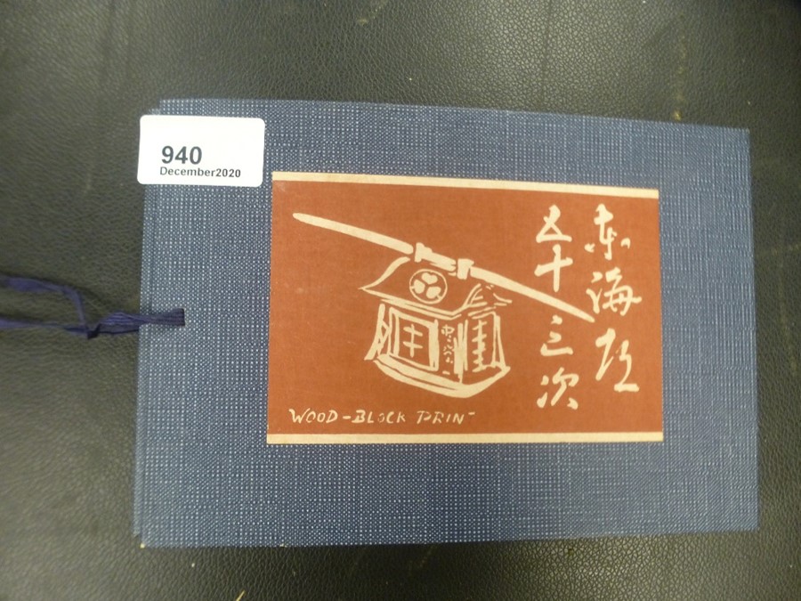 A modern Japanese album of small wood cut prints.