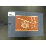 A modern Japanese album of small wood cut prints.