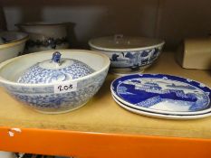 A Chinese blue and white bowl, two small platters and other items