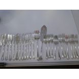 A Victorian silver cutlery set comprising of twelve forks, twelve fish knives, one large serving for