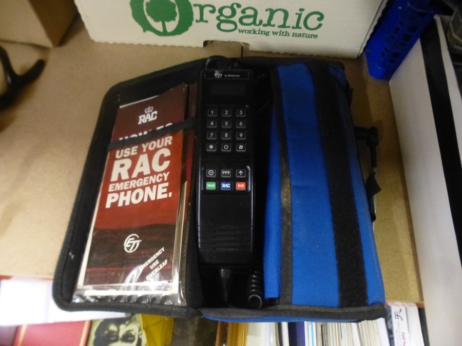 An old R.A.C emergency mobile phone in fitted soft case