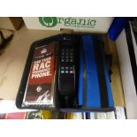 An old R.A.C emergency mobile phone in fitted soft case