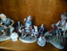 Three capodimonte figure groups and four small figures