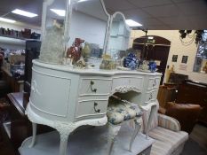 A French style cream dressing table on cabriole legs with a matching stool