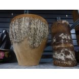 Two animal skin drums