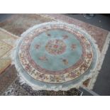 A modern Chinese circular rug, cream bordered, 203cm