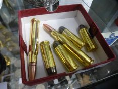 6 x brass bullet penknives