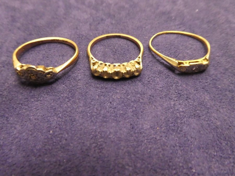 9ct yellow gold and platinum dress ring, another 9ct yellow gold example and an 18ct yellow gold and