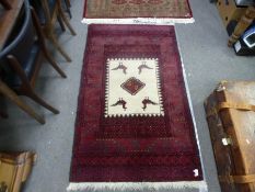 A modern Afghan rug, the central panel decorated with four birds