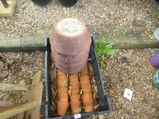 Crate of terracotta flower pots, chimney pot etc