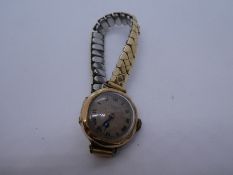Vintage 9ct gold cased ladies wristwatch 'J W Benson' case marked 375, on rolled gold strap