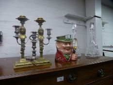 A Beswick character jug, a pair of brass candlesticks and sundry