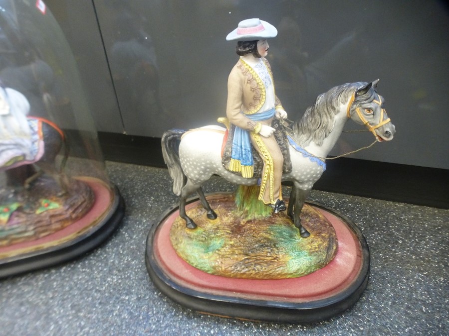 A pair of early 20th century bisque figures of Spanish rider on horse and lady on donkey, under anti - Image 4 of 10