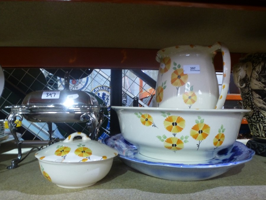 A silver plated chafing dish on stand, ewer and basin, blue and white china etc