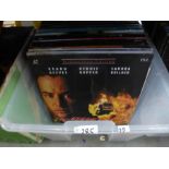 Two boxes of laser discs movies, including Apollo 13, the Rock and Men in Black, etc