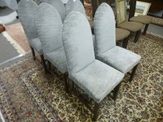 A set of six mahogany dining chairs having lancet tops