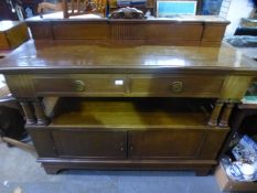 A mahogany two tier buffet having two drawers