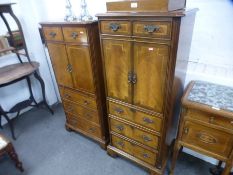 Two similar reproduction cabinets with drawers below