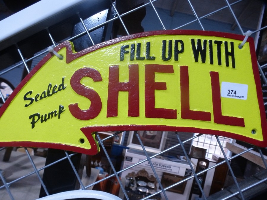 Large shell arrow sign